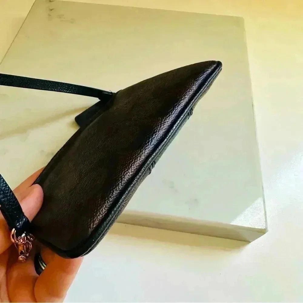 Coach Corner Zip Wristlet In Signature Leather